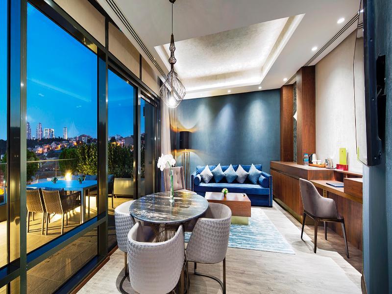 Hotel Doubletree By Hilton Istanbul - Piyalepasa Exteriér fotografie The living room of a Sky Suite